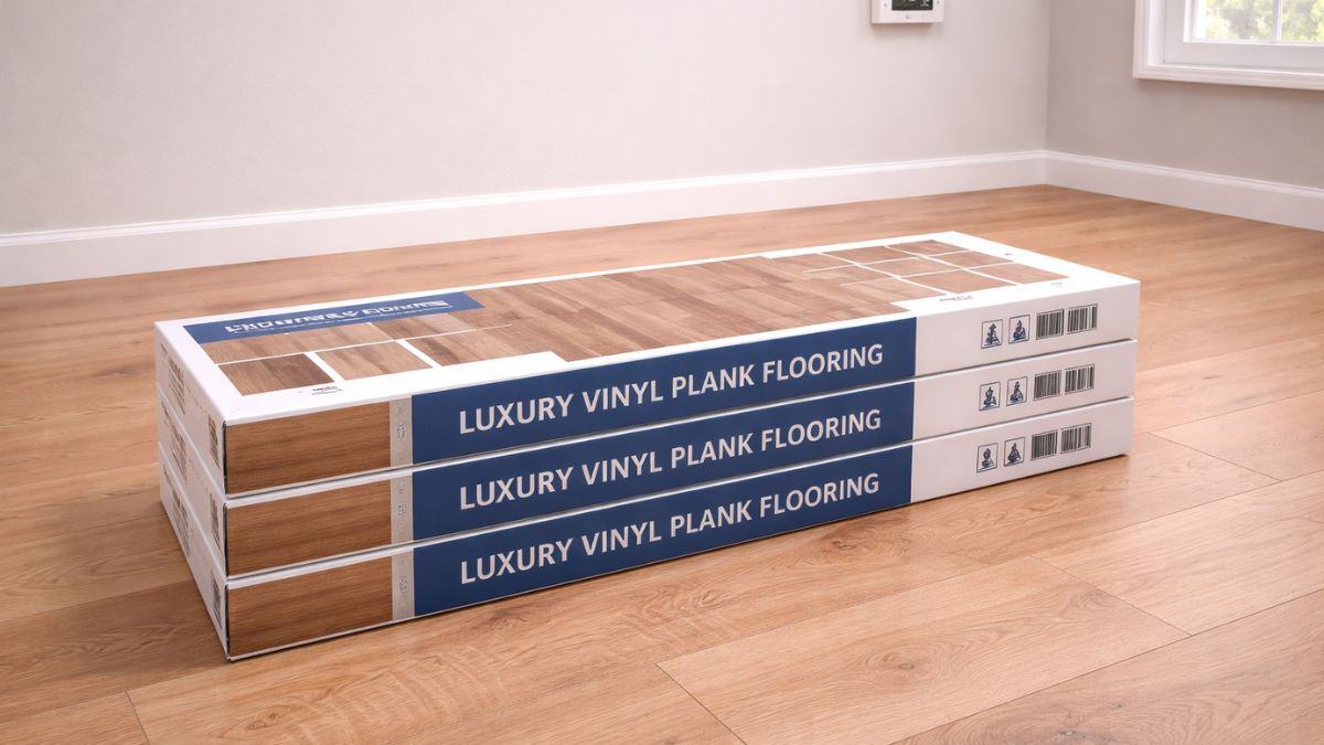LVP flooring boxes stacked flat in room to acclimate before installation